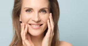 Smiling woman with clear skin results of a AquaFirme Facial in Scottsdale, AZ